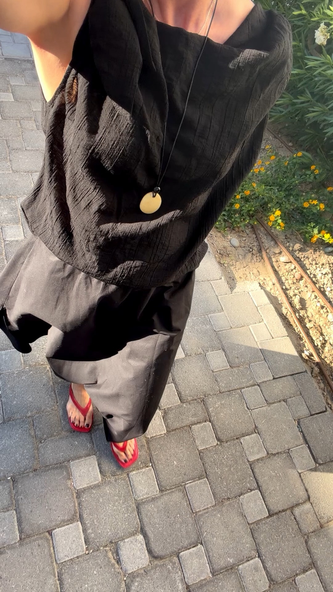 Day one. This black poplin skirt has been a summer favourite of mine for  several years now. Great with everything from vests - to trees, to shirts, tops , jackets and jumpers. This top was a sale buy but I’ve found one similar 
Add a pop of red and a statement pendant to rotate an all black look x

#LTKsummer #LTKstyletip #LTKover50style