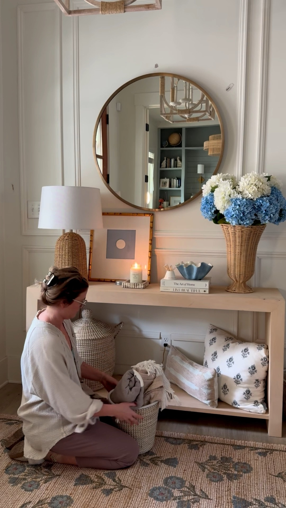 The entryway is ready for spring! Besides needing to repaint the wall where the command hooks ripped the paint off, I love how the space turned out! A new block print rug gives the room a fresh feel  

#LTKstorytime #LTKvlog #LTKHome