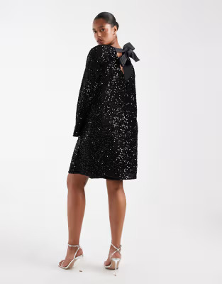 Pieces Curve sequin mini dress with ribbon bow back in black | ASOS (Global)