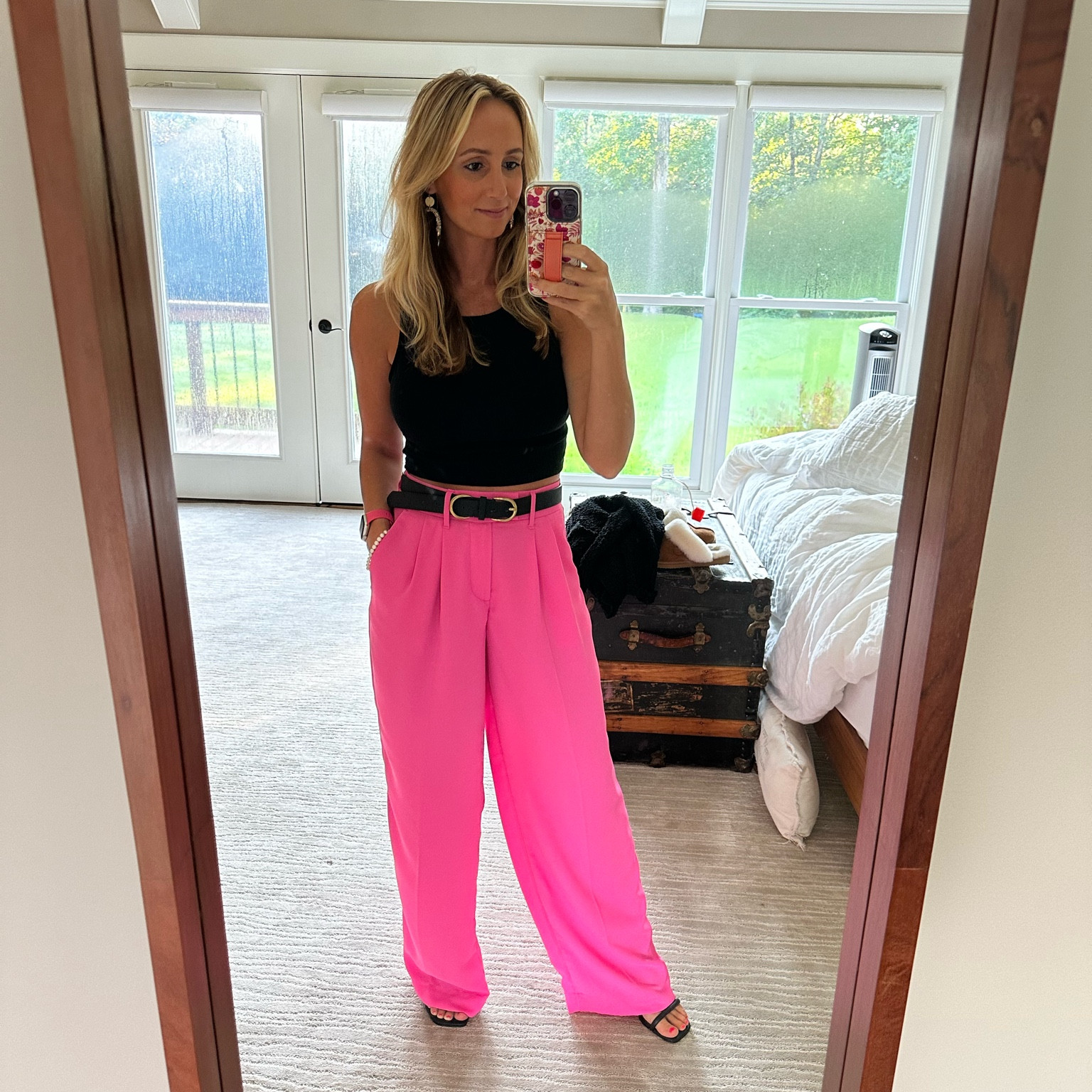 Work outfit of the day for the office. Loving the pop of color contrast 

Pink palazzo dress pants from target 
Black belt
Black shoes
Black tank (part of a 2-piece skirt/shirt set)

#LTKSeasonal #LTKunder50 #LTKworkwear