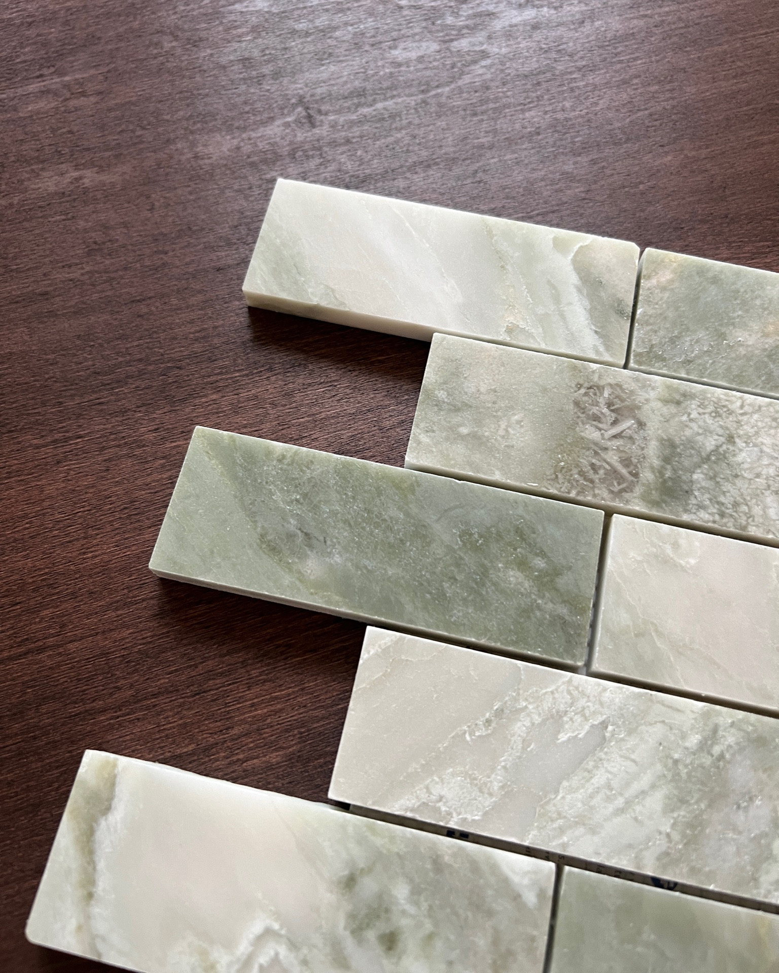 Green brick lay tile I’m using for the backsplash of my fireplace! I purchased 6 12”x12” pieces for the project  

#LTKhome