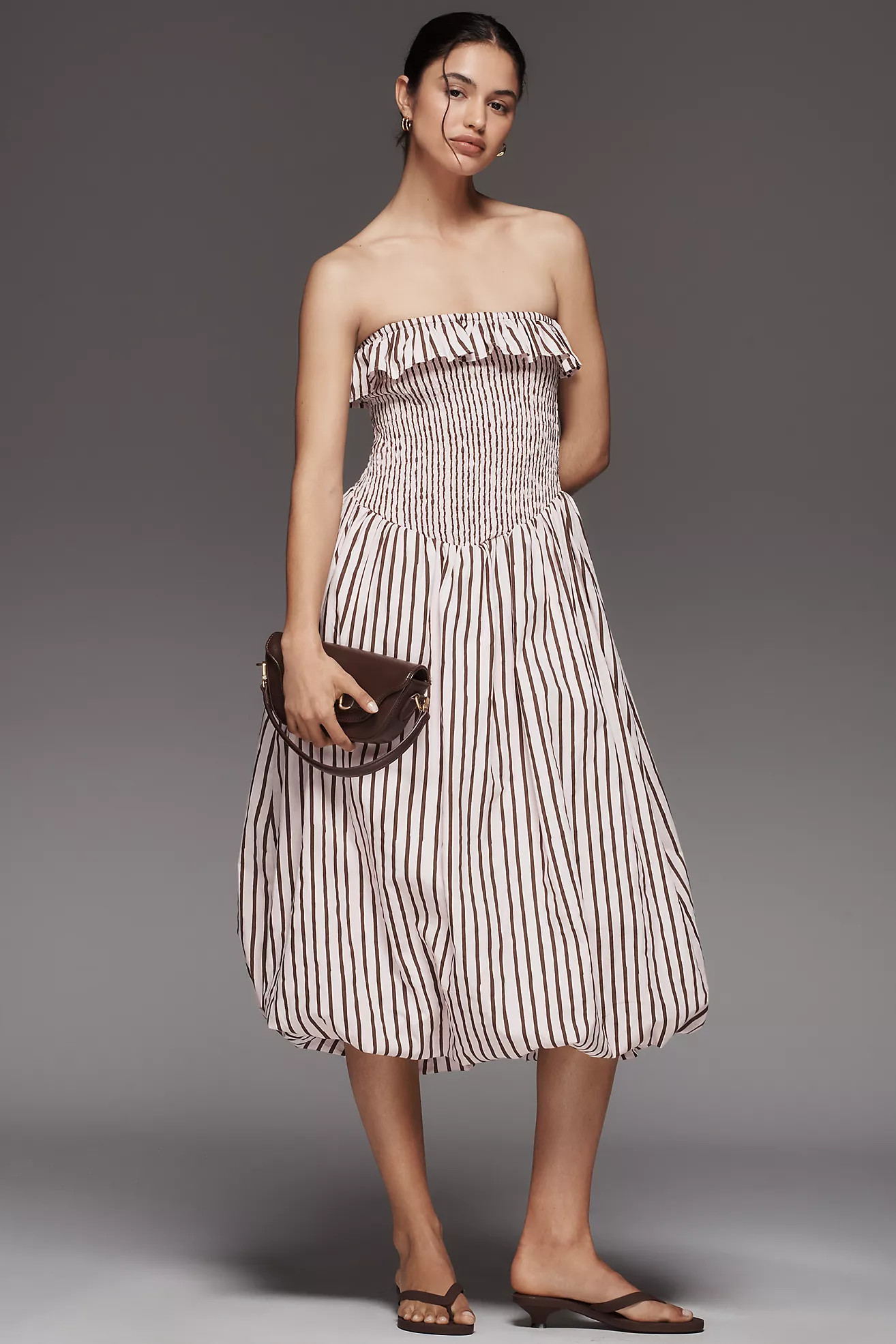 Emma Mulholland on Holiday Strapless Smocked Bubble Dress | Anthropologie (US)