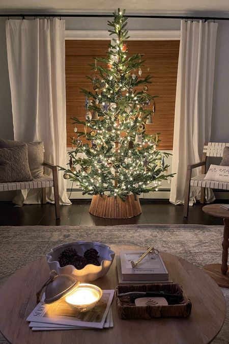 Loving this Christmas glow ✨ neutral Christmas, wood tree collar, living room decor, neutral living room 

#LTKstyletip #LTKHoliday #LTKSeasonal