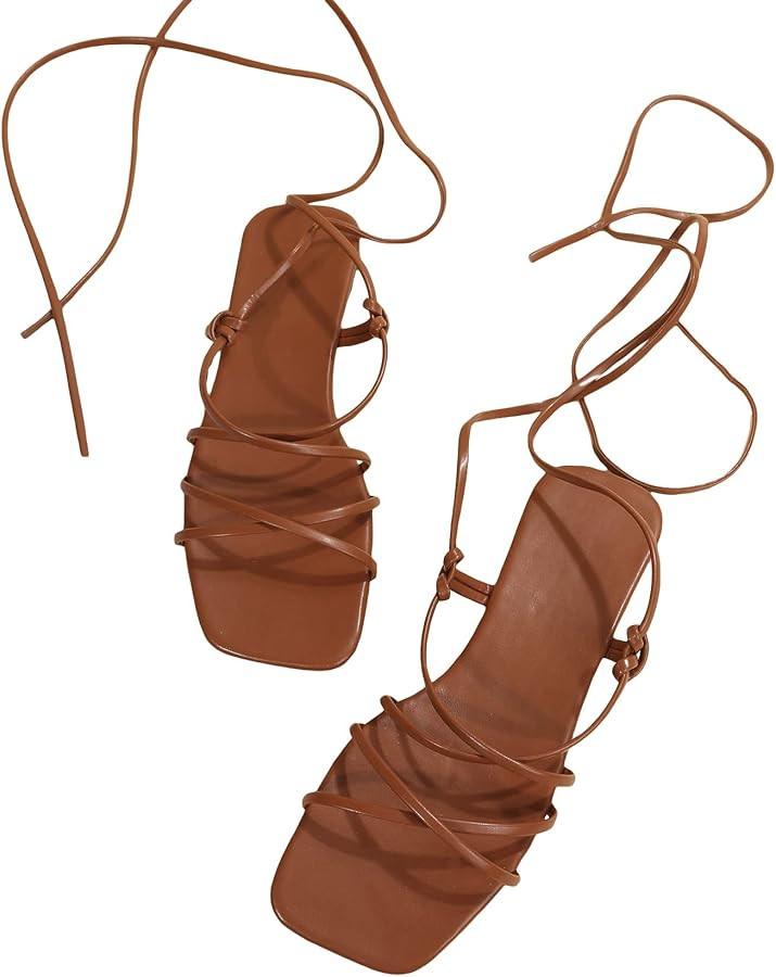 GORGLITTER Women's Lace Up Strappy Toe Ring Flat Sandals Tie Leg Leather Sandals | Amazon (US)