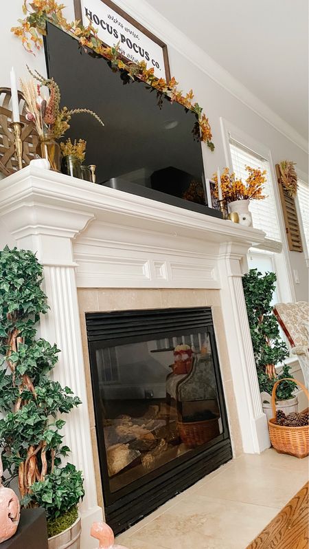Fall mantel styling inspo! Add some greenery and autumn leaves to bring a warm and cozy vibe to your living room! #falldecor #amazonfinds #livingroomdecor #mantledecor #walmartfinds

#LTKSeasonal #LTKhome #LTKfindsunder100