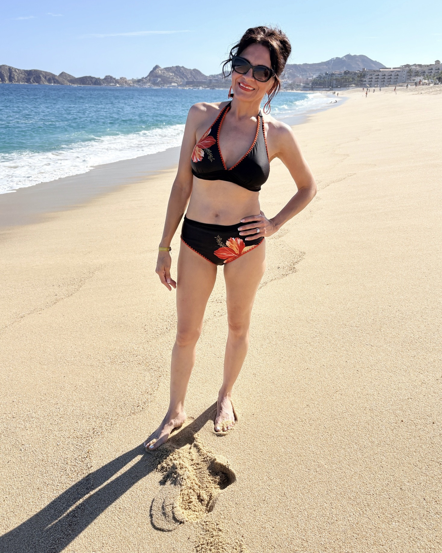 My obsession with bathing suits continues …😅🌺 I seriously love them all! Give me tropical prints, bold colors, florals, or classic black and I’ll happily pack a different one for every vacation day.

This black Hawaiian floral bikini instantly became one of my Cabo favorites. There’s just something about tropical flowers, warm sunshine, and the ocean that makes my heart so happy. ☀️🌊

Life is short… wear the cute swimsuit, book the trip, and make the memories. 🤍

All my vacation looks are linked! Which swimsuit style is your favorite? 🌺👇

#BeachStyle #VacationMode

#LTKOver40 #LTKSaleAlert #LTKTravel