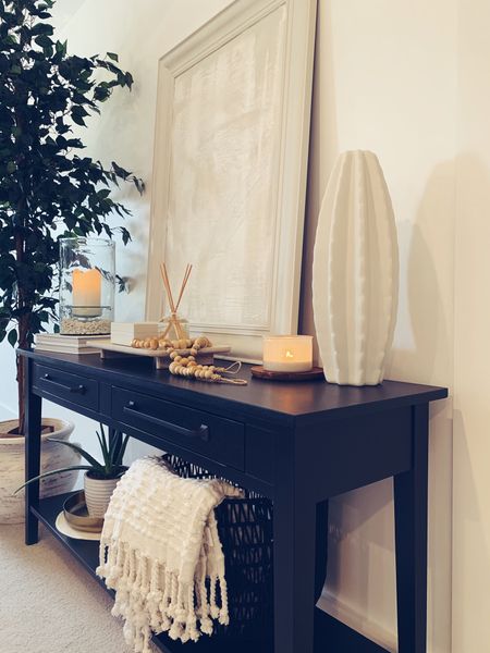 Full Video on Uplifted Beauty’s YouTube on how I made this “kit” console table for under $350! Black Console Table
Sofa table,
Console Table Styling
Neutrals, Neutral Decor
McGee & Co inspired , Console Table styling, decorative objects, coffee table, bookcase, bookshelf


#LTKSeasonal #LTKfamily #LTKhome