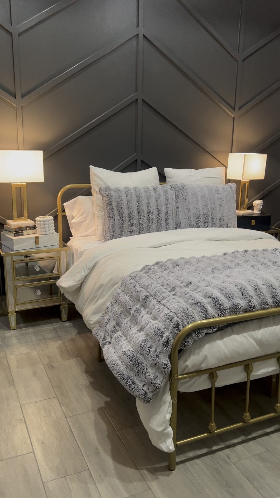 Moody Bedroom Asthetix

#goldbedframe #metalbedframe #lamp #goldlamp #mirrornightstand #glassnightstand #nightstand #comforter #decorativeboxes #boxes #decor #bedroom #sparebed #guestbed #guestbedroom #bedroomstyle #blackwall #moody #moodyroom

#LTKVideo #LTKMostLoved #LTKhome