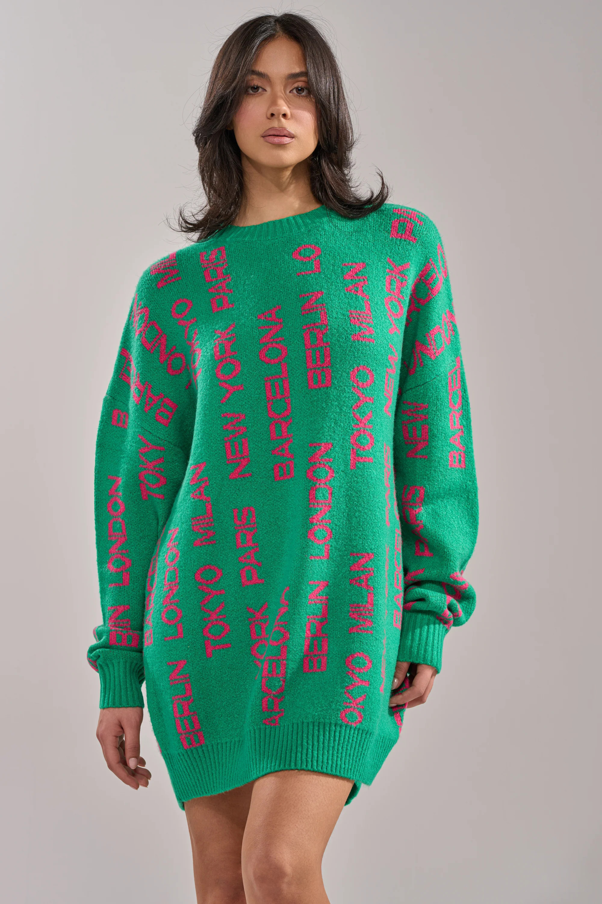 AROUND THE WORLD SWEATER MINI DRESS IN GREEN | AKIRA