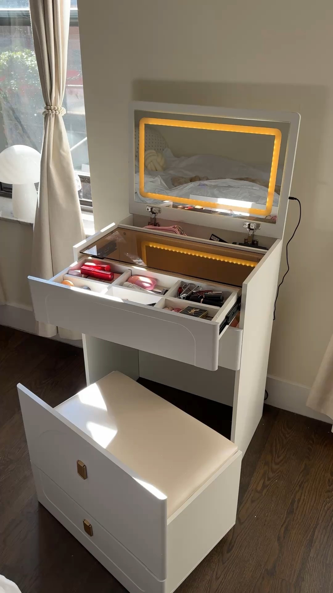 The BEST thing in my NYC apartment is this makeup vanity, desk, and shelf all in one! 