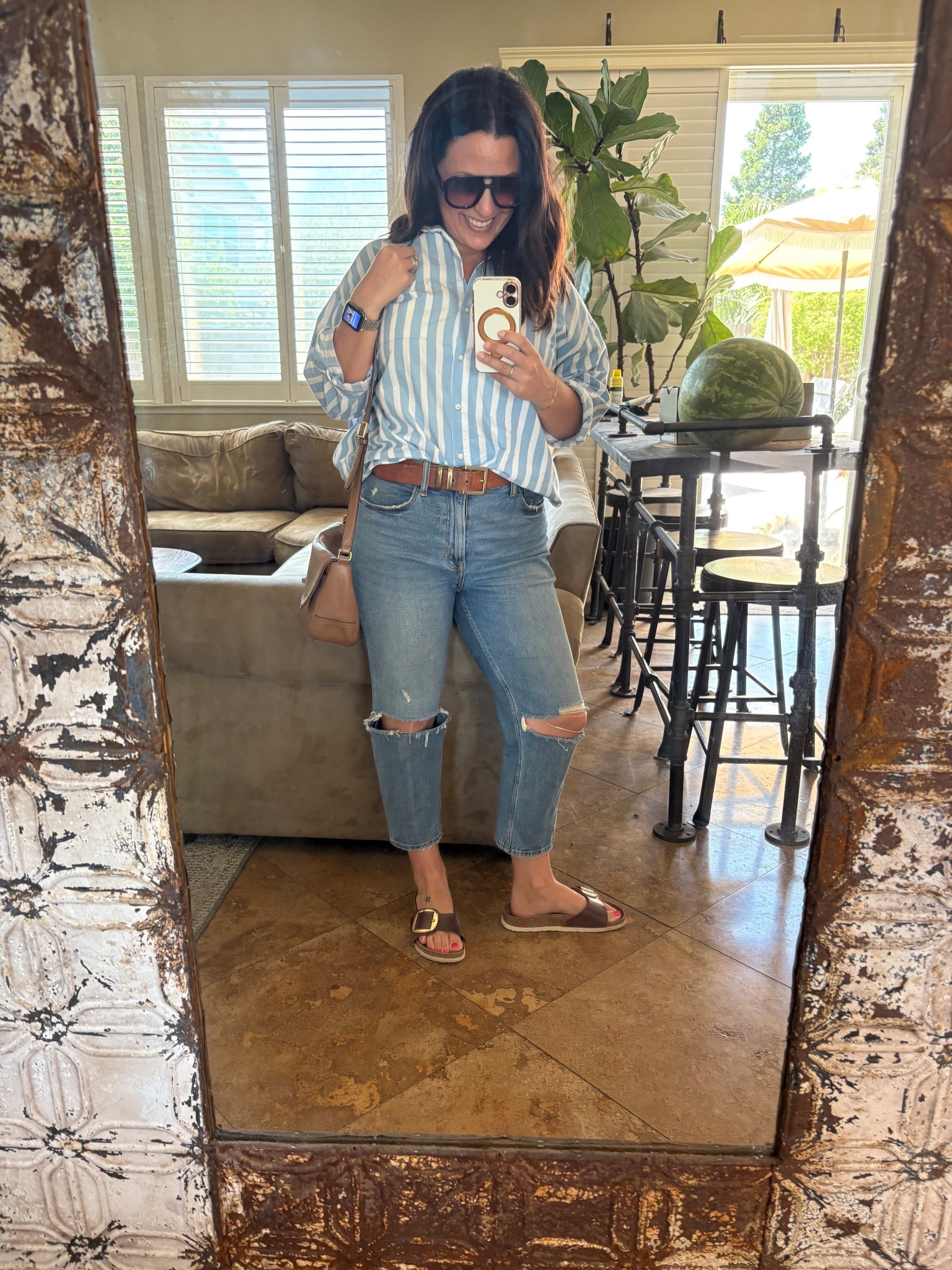 Costco run and play date on the agenda for this afternoon. I had someone tell me cropped jeans are dated and out of style. Being over 40, I’m okay with both not being on trend. There is a calm and peace that comes with wearing what you want and not worrying about the opinions of others and I’m here for it! 

Weekend style 
Button down shirt
Birkenstock Big Buckle

#LTKOver40 #LTKStyleTip #LTKPetite