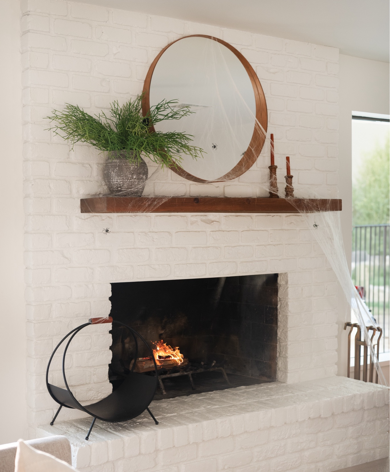  When it comes to Halloween decor, it’s all in the details. 🕷️✨ Our team had fun decorating our office fireplace mantel into a haunting focal point with faux spider webs delicately draped, and tiny spiders creeping across—spooky sophistication at its finest.

Shop this full Halloween inspired fireplace mantel here!