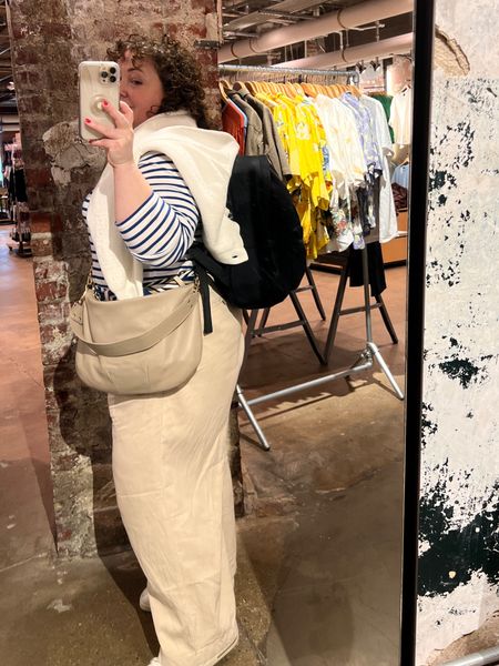 What to wear for 24 hours in NYC? A striped tee, wide leg pants, super comfy and supportive shoes, and refined bags that hold a lot. And a cardigan! I added a scarf as a belt for polish 

#LTKtravel #LTKover40 #LTKmidsize