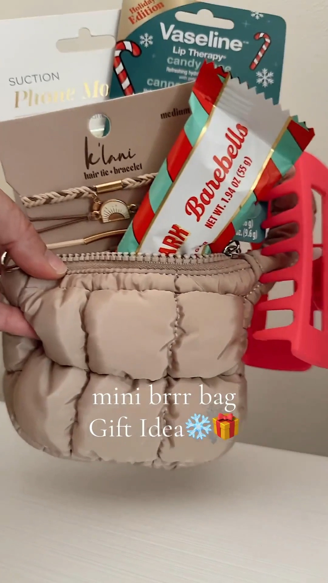 This is a fun one! MINI brrrr bags❄️
These little key chain bags are all the rage! Fill em and make a bunch! A hit for all! Change colors out for more luxe! 🎁
What’s inside:
Bag
Protein bar (we are obsessed with these!)
Claw clip 
Bracelet hair ties 
Case mate phone mount 
Lip gloss (take out of package) 

Change up color way for a more luxe feel! 🎁🍾 add a gift card or whatever you wish! 

#LTKGiftGuide #LTKHoliday #LTKselfcare
