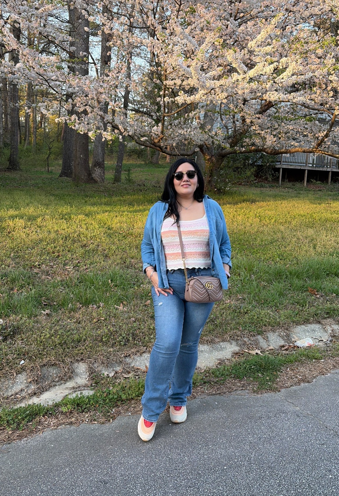 Wearing size L in the denim shirt 
