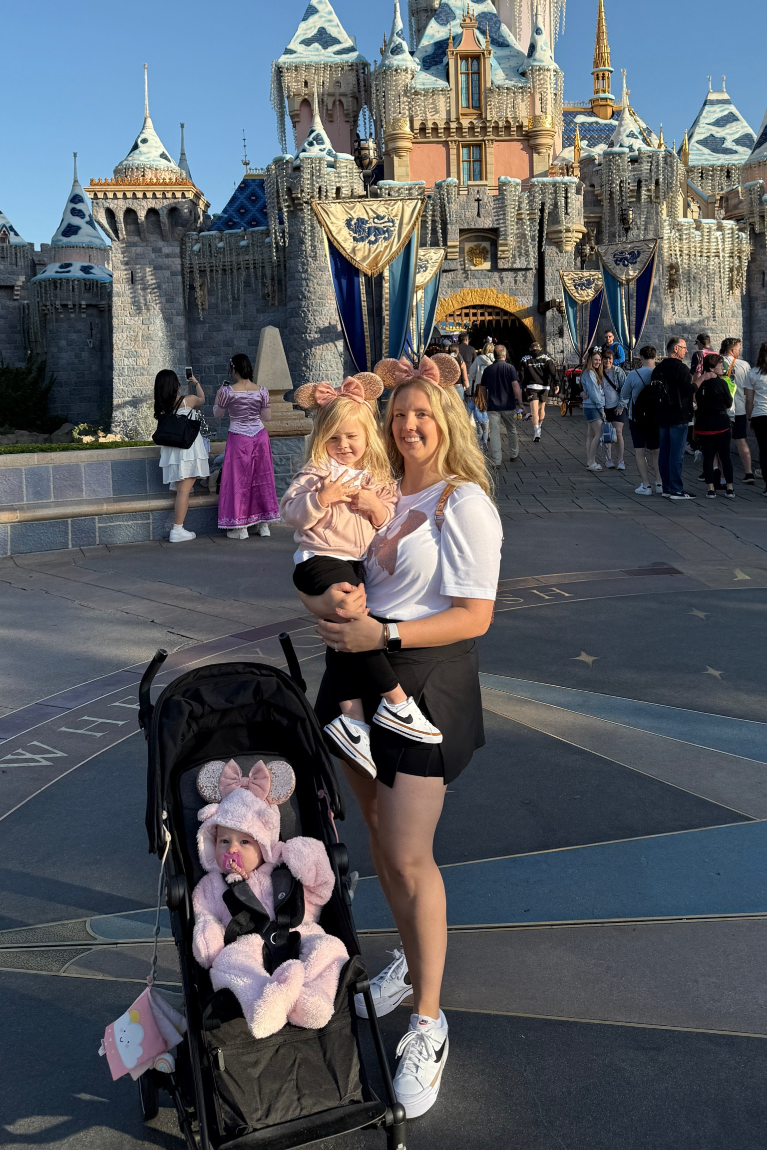 Matching family Disney outfits with glitter Minnie Mouse ear silhouette and sequin Minnie Mouse ears headbands. Rose gold Disney look. Family matching vacation look. Even have matching Nike sneakers!

#LTKTravel #LTKKids #LTKFamily