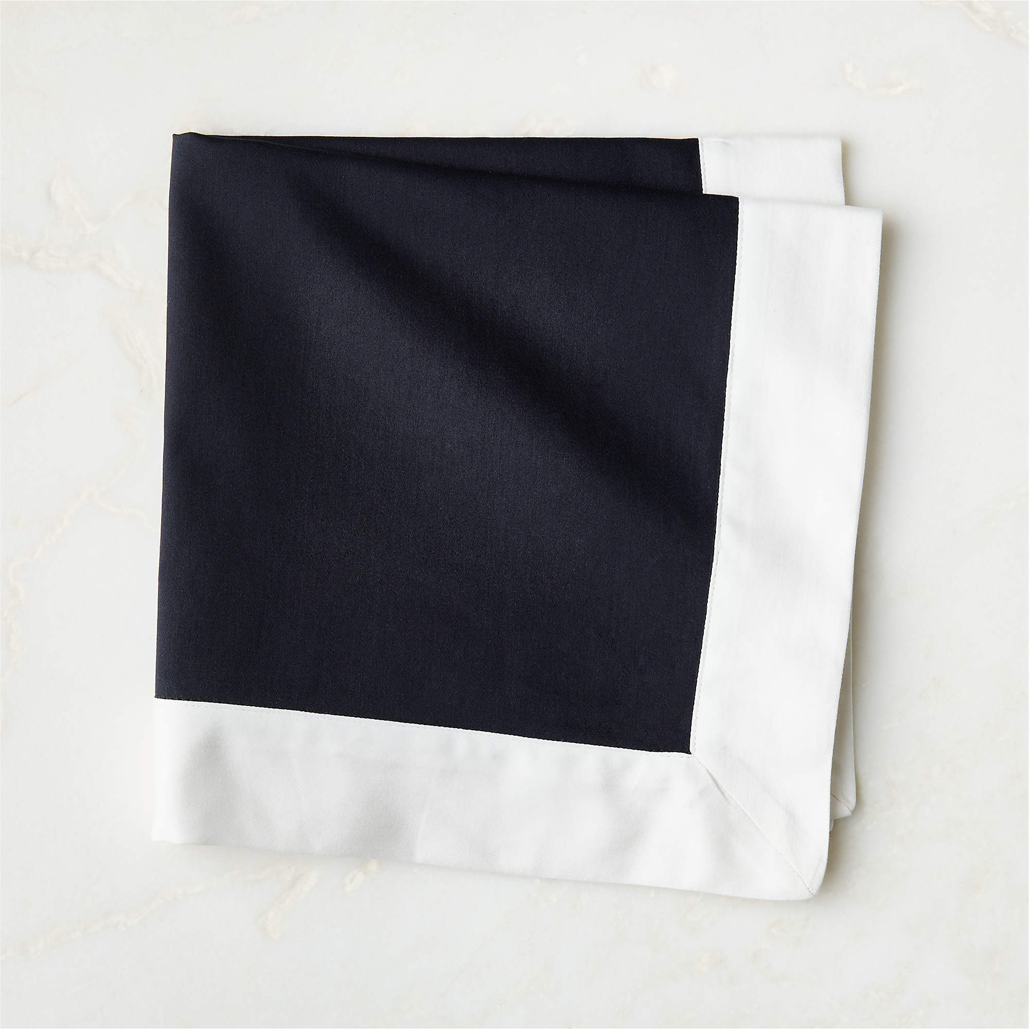 Mara Black with White Bordered Organic Cotton Sateen Napkin | CB2 | CB2
