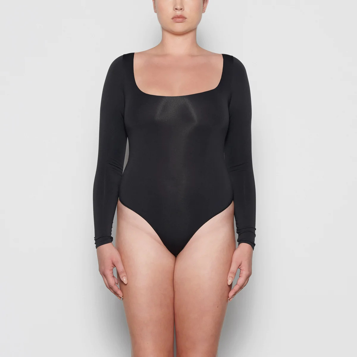ESSENTIAL LONG SLEEVE SCOOP NECK BODYSUIT | SKIMS (US)