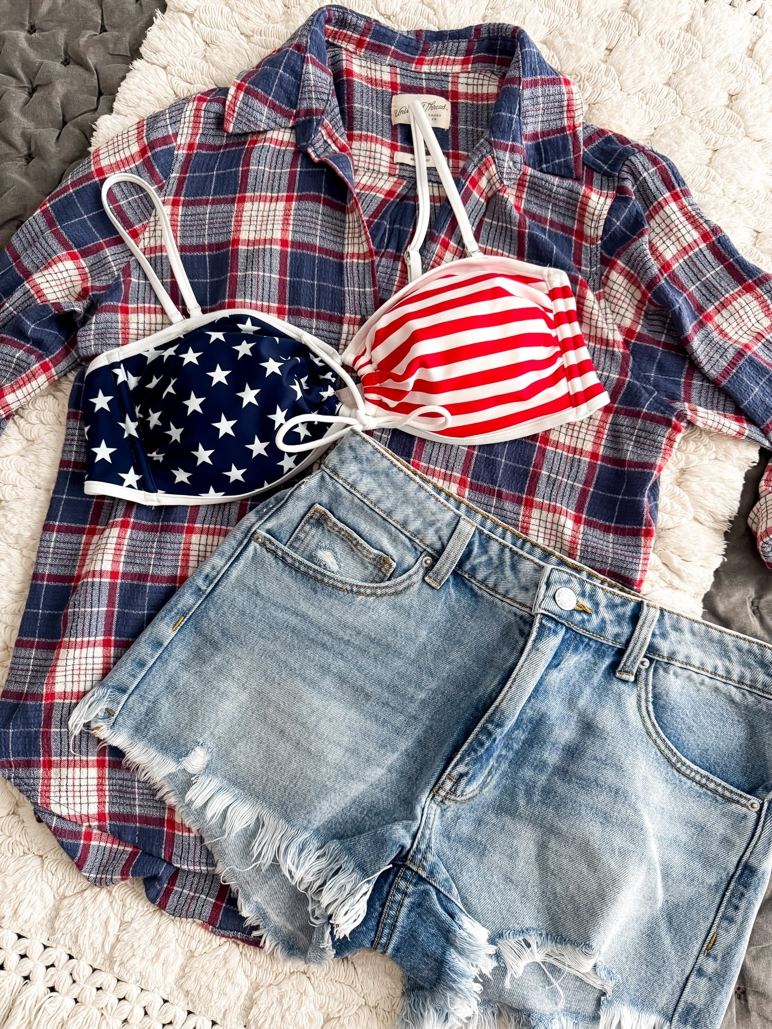 This might just be my favorite patriotic outfit of the season! ❤️🤍💙 I wore this look for the 4th of July and already know I’ll be reaching for it all month long. The oversized plaid button-up paired with distressed denim shorts gives the perfect laid-back, all-American vibe, and the adorable flag-inspired bikini top peeking through makes it fun, festive, and effortlessly cute. I paired it with classic red bikini bottoms for the perfect pop of color! Whether you’re headed to the lake, beach, BBQ, boat day, fireworks, or just soaking up the sunshine, this outfit is one you’ll want to wear on repeat. It’s comfy, versatile, and gives all the summer vibes!

#LTKStyle #LTKSummer #LTKSwim #LTKFashion #PatrioticStyle #FourthOfJulyStyle #AmericanaStyle #RedWhiteAndBlue #SummerOutfit #LakeDayStyle #BeachOutfit #BoatDayStyle #CountryChic #CasualStyle #SummerWardrobe #DistressedDenim #PlaidShirtStyle #OversizedShirt #WeekendStyle #VacationStyle #PoolsideStyle #FireworksReady #OOTD #SummerVibes #ShopTheLook #TrendingNow #FashionFinds #StyleInspo #ViralFashion #JulyStyle

patriotic outfit • 4th of July outfit • July outfit ideas • red white and blue outfit • Americana fashion • patriotic swimsuit • flag bikini top • plaid button up shirt • oversized plaid shirt • distressed denim shorts • women’s denim shorts • lake day outfit • beach vacation outfit • boat day outfit • BBQ outfit • summer style • casual summer outfit • vacation wardrobe • poolside outfit • patriotic fashion • summer outfit inspiration • western summer style • country concert outfit • trendy women’s clothing • cute summer clothes • July fashion • holiday weekend outfit • easy summer style • everyday summer outfit • LTK fashion finds

#LTKootd #LTKOver40 #LTKSwim