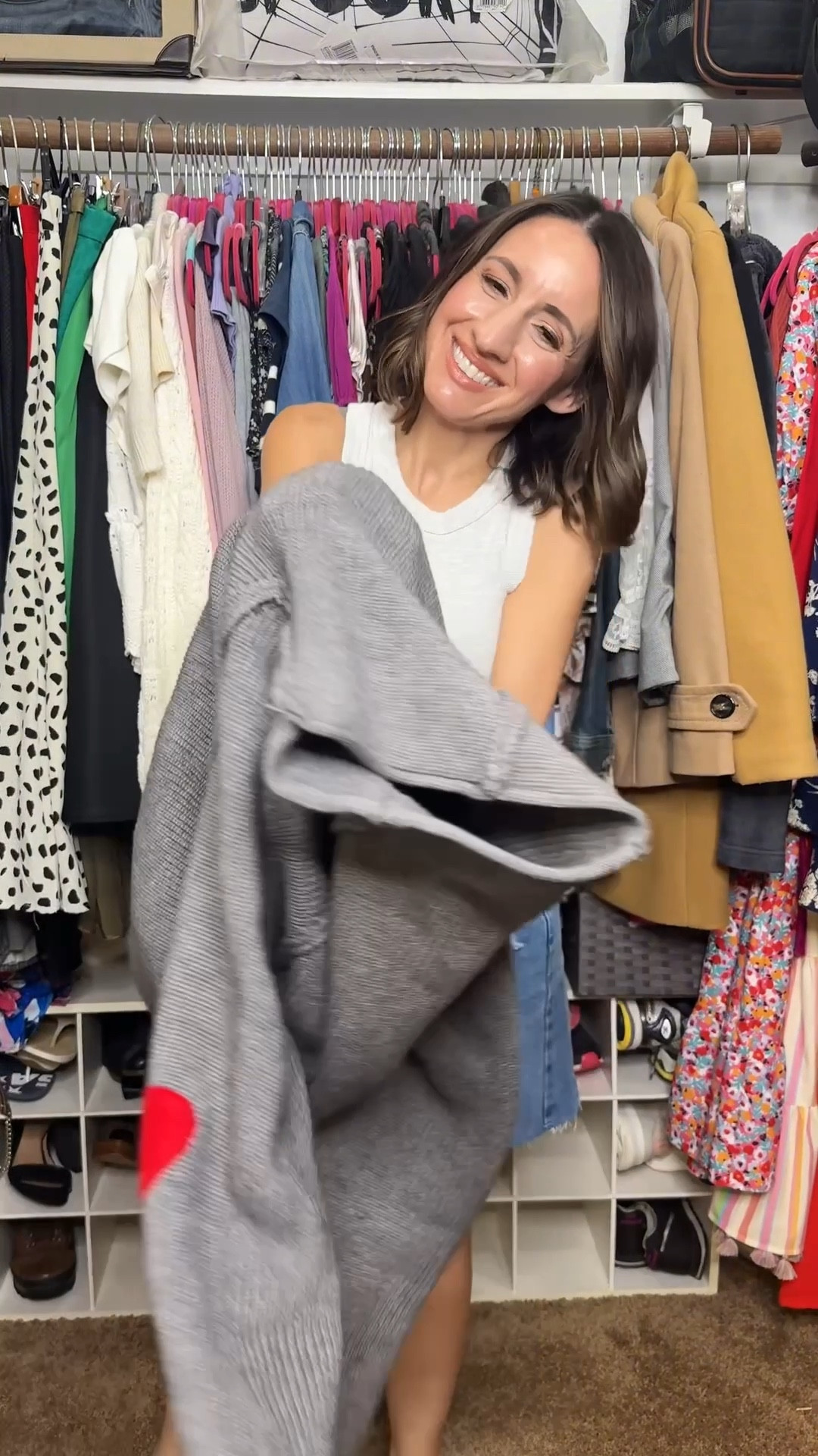 Petite outfit for fall and winter temps. 
Grey sweater with hearts. 
Denim skirt. 
Black ankle booties. 
Cute neutral handbag  

#LTKPetite #LTKOver40 #LTKmomlife