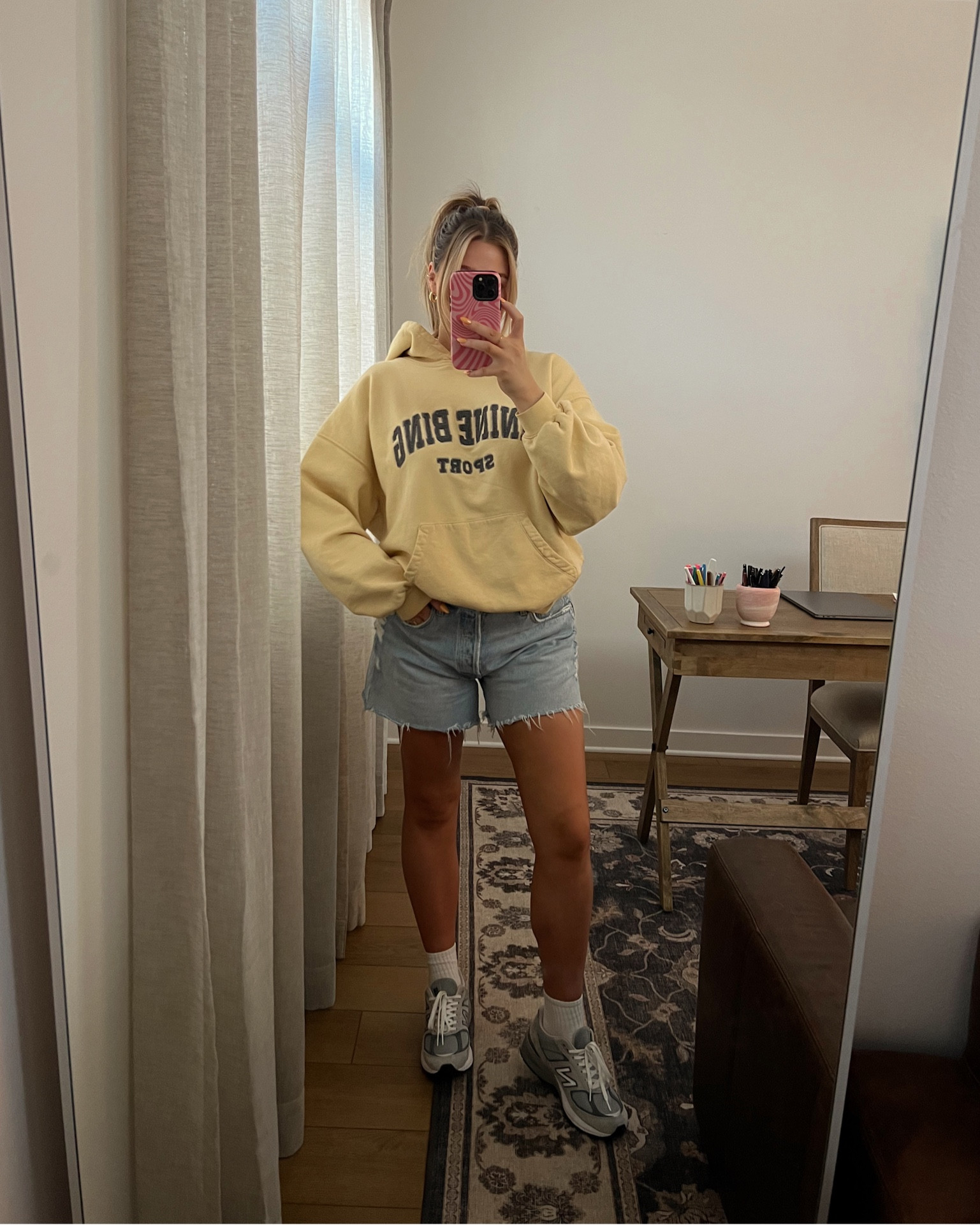 Agolde Shorts size 30 I typically would wear a 29 but the 30 fits great looser fit postpartum not too rigid and a great length. M in Anine Bing sweatshirt! Bought my true size in new balance sneakers 