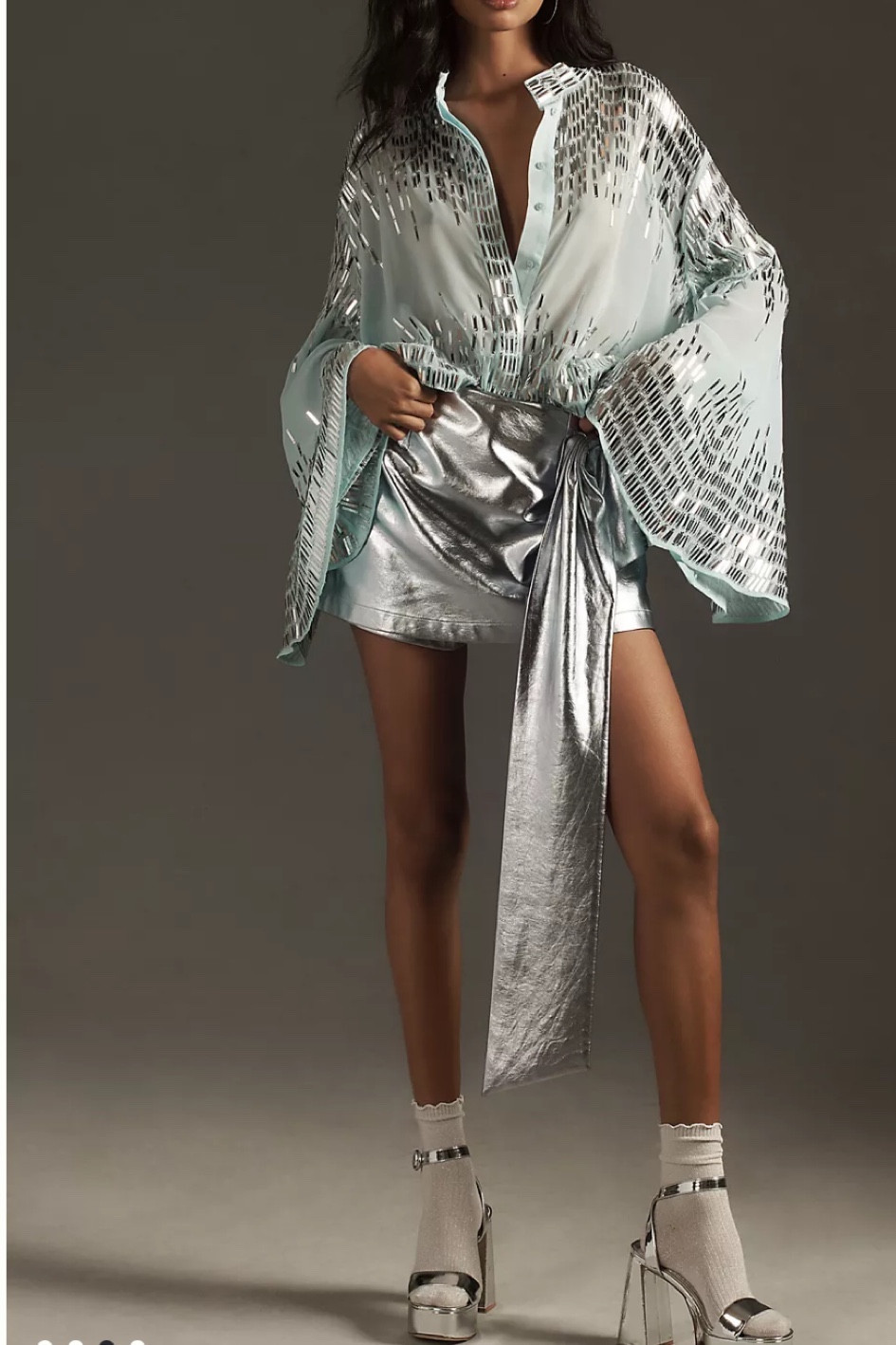 I love everything about this outfit!! The sequin blouse and silver foil bow skirt are freakin gorgeous! 

#LTKHoliday #LTKCyberWeek