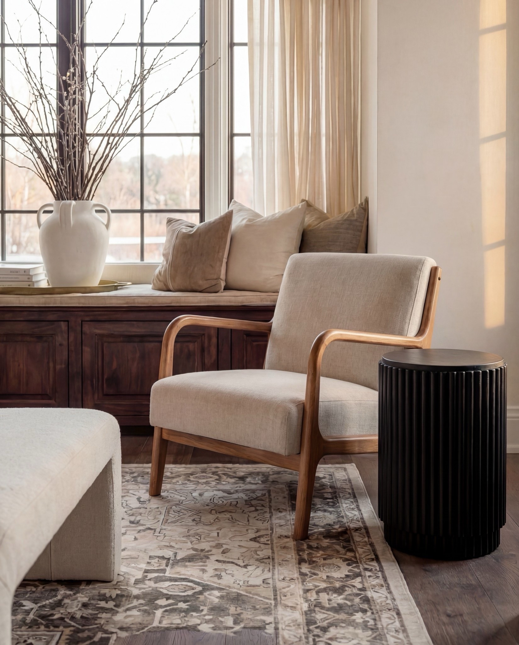 Shop the Look:
• Upholstered wingback bed (ivory fabric)
• White cotton bedding set
• Neutral euro pillows
• Black and tan patterned accent pillows
• Chunky knit throw blanket (camel brown)
• Dark black wood nightstands
• Decorative bunny Brass table lamps with white shades
• Framed abstract wall art (neutral tones)
• Vintage-style area rug (beige and taupe)
• Dark black wood dresser with brass hardware
• Brass ring drawer pulls
• Glass hurricane candle holders
• White pillar candles
• Decorative brass tray
• Sculptural brass decor object
• Small stone sculpture 
• Light beige linen curtains
• Ceramic vase (off-white)
• Decorative branches
• Coffee table books (neutral covers)
• Upholstered bench at foot of bed (cream fabric)
•upholstered wood accent chair 
•round ribbed black end table 

#LTKSaleAlert #LTKHome