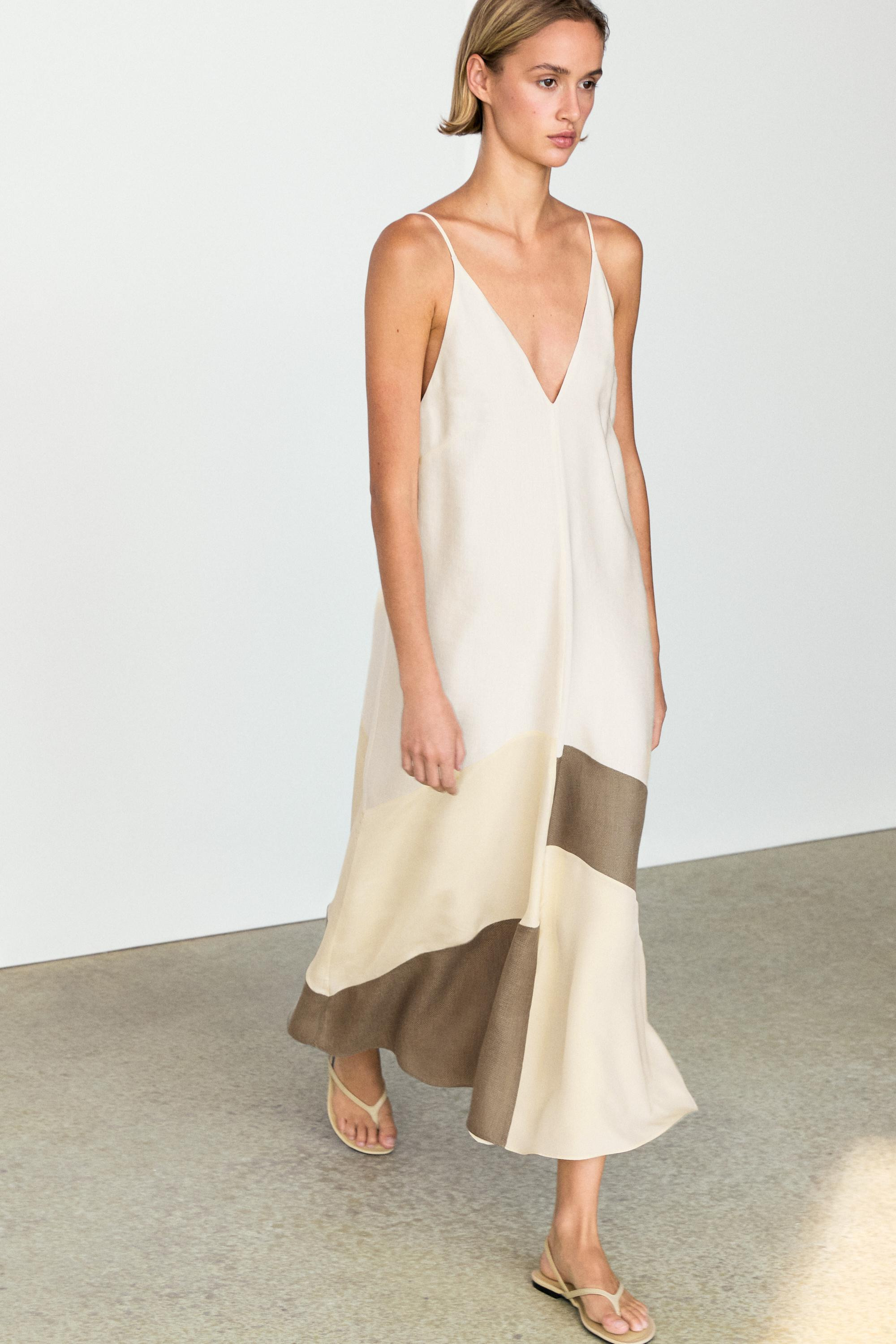 Dress crafted from a flowing fabric. Midi-length design featuring a deep V-neck and spaghetti str... | Massimo Dutti US