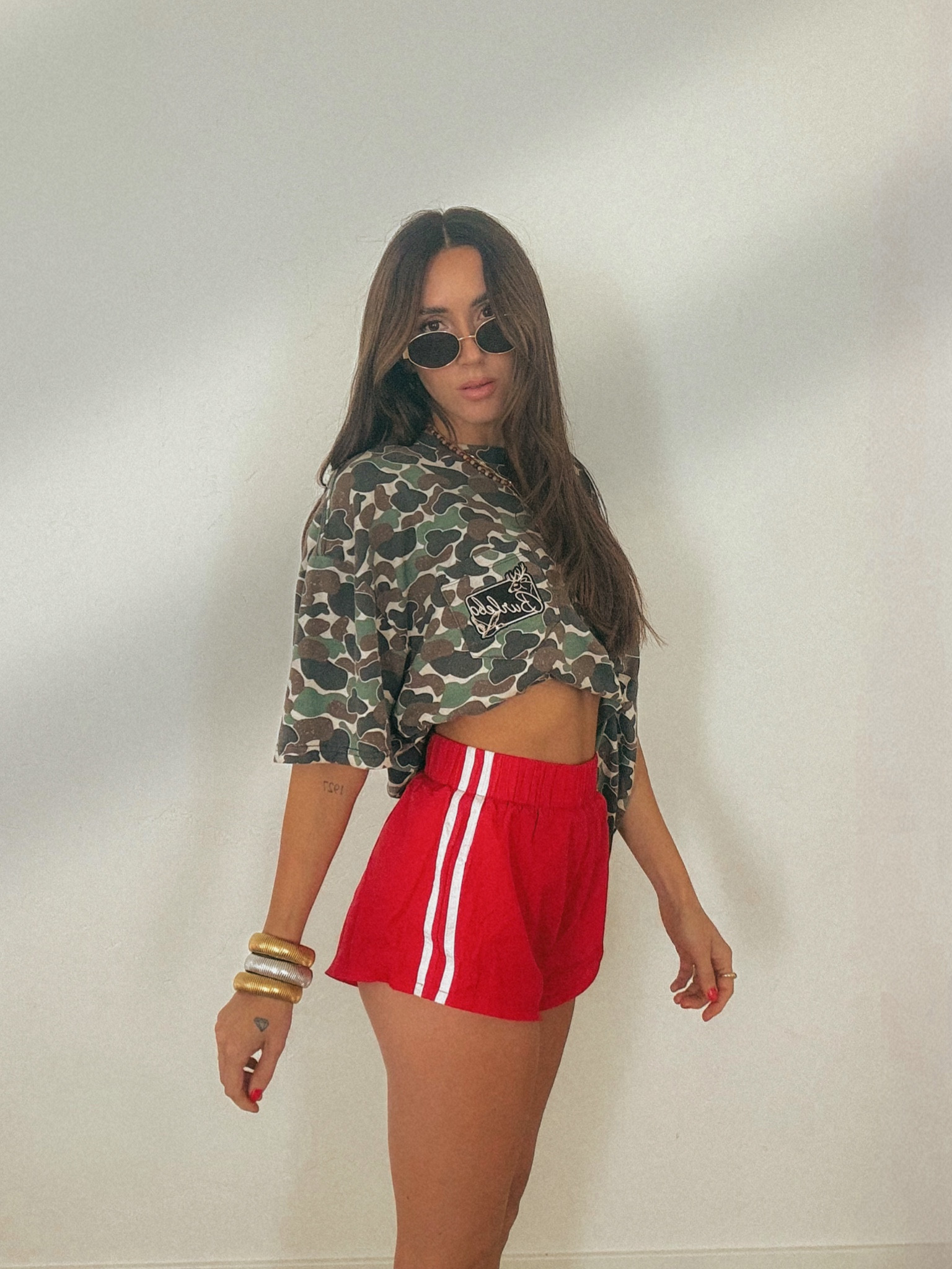 Camo shirt + red shorts 