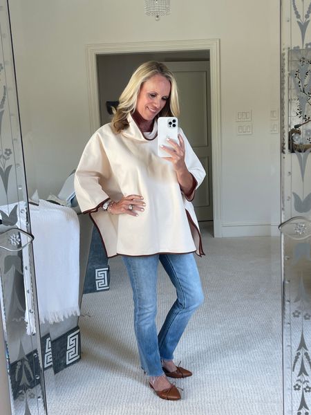 Ivory poncho with luxe faux leather trim from Tuckernuck friends and family sale. Up to 30% off with code ENJOY
One size 

#LTKSeasonal #LTKstyletip #LTKsalealert