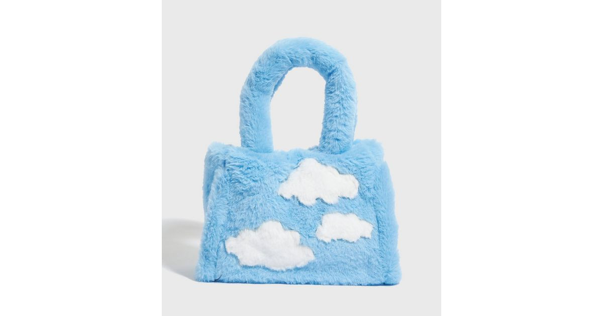 Skinnydip Bright Blue Cloud Faux Fur Tote Bag
						
						Add to Saved Items
						Remove from S... | New Look (UK)