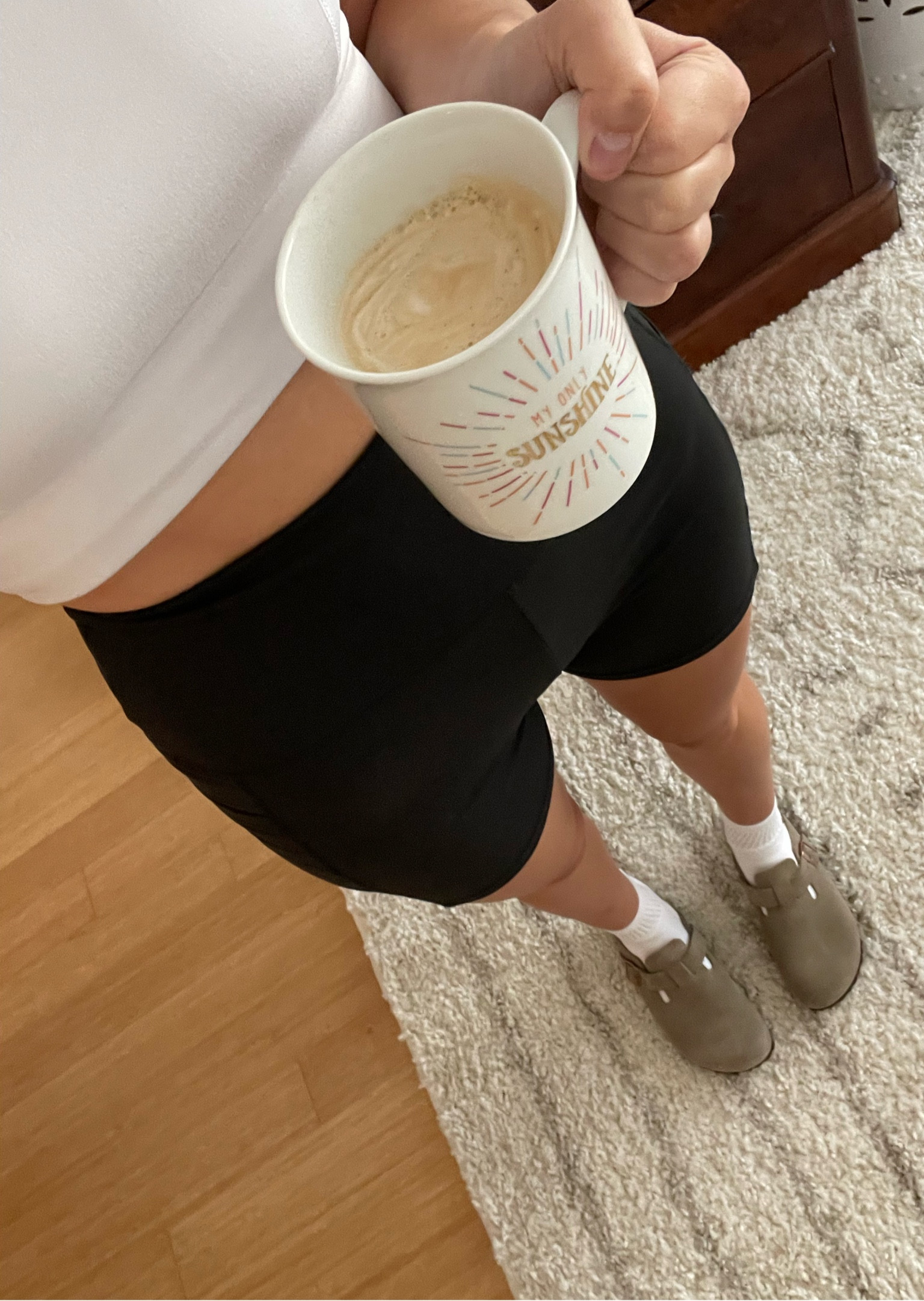 Work from home uniform - biker shorts, sports bra, Birkenstocks and coffee 

#LTKfit #LTKworkwear #LTKstyletip