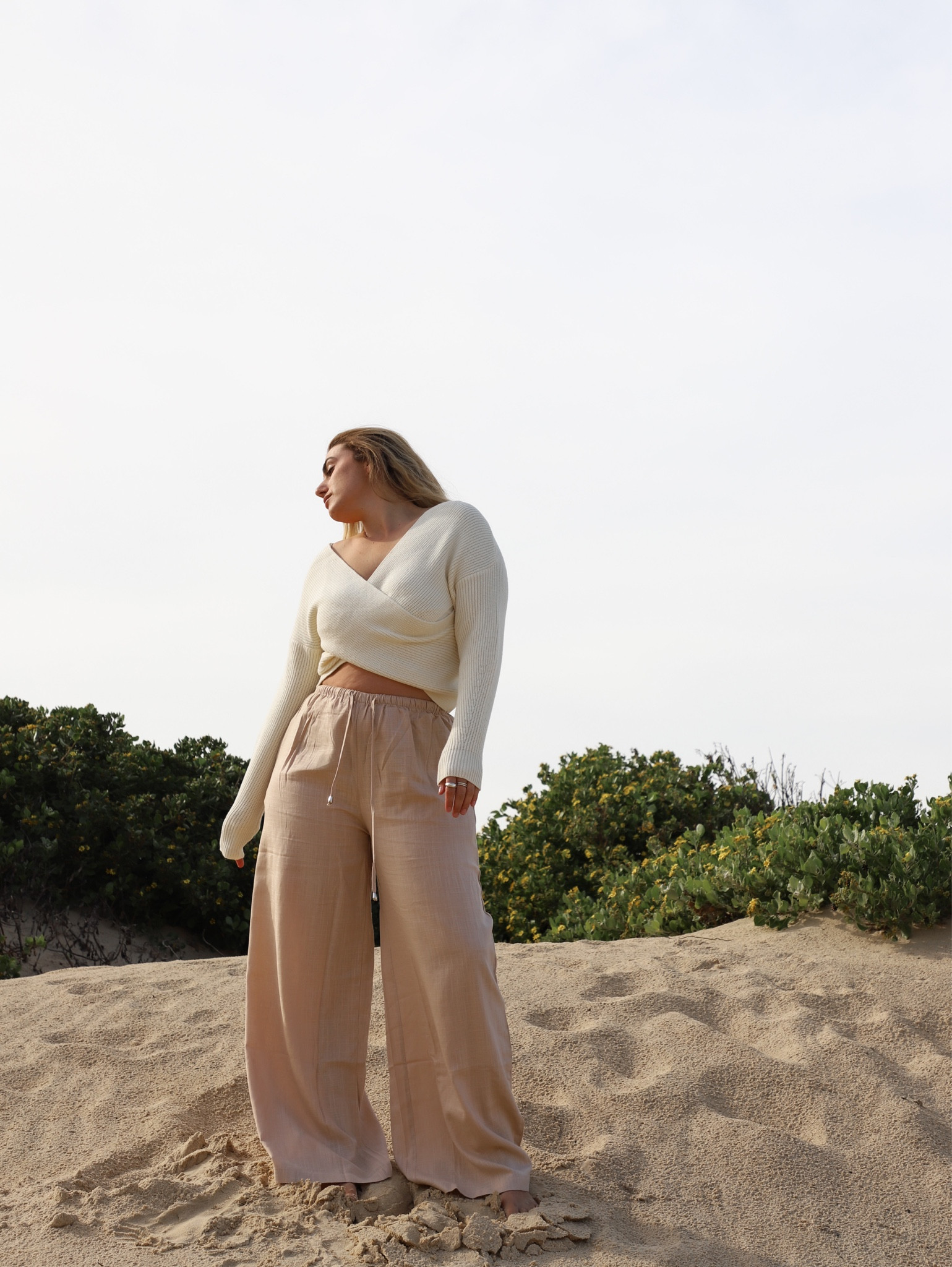 The perfect autumn outfit for this season. White knit and relaxed pants for a casual brunch look by the beach. Simple easy outfit neutral tones earthy coastal style 

#LTKaustralia #LTKFind #LTKSeasonal