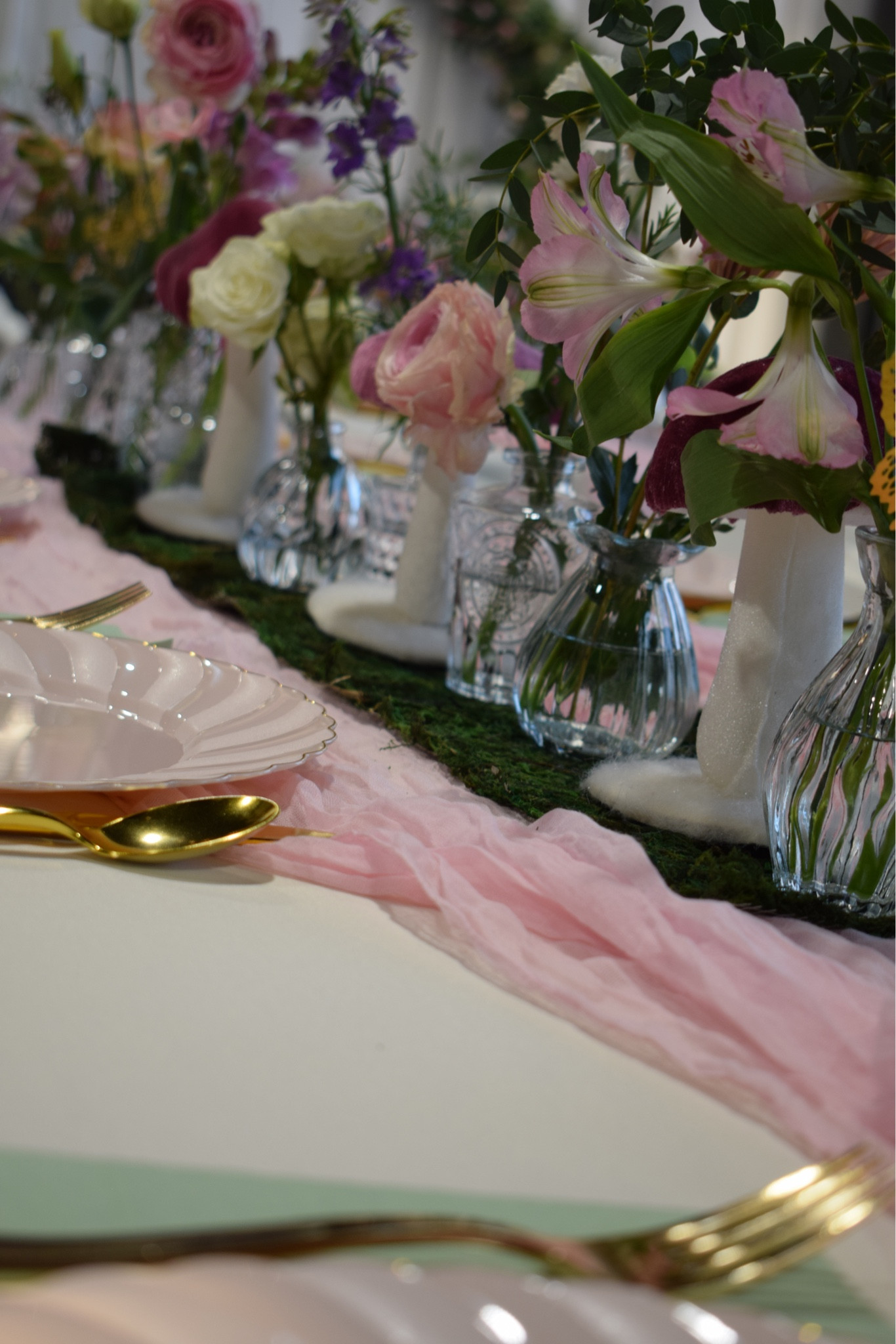 Bud vases make the best centerpieces for parties, they are inexpensive, you can bunch them together for make long but arrangements without tons of flowers 

#LTKHome #LTKSeasonal #LTKmomlife