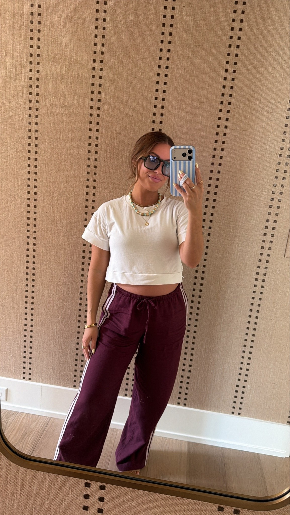 Wearing a small in these burgundy track pull on pants — super cute & fun color that will transition into fall. Paired with an old white tee, but linking similar! Also linking my Amazon sunglasses!

Maternity, bump friendly, linen pants, track pants

#LTKootd #LTKmomlife #LTKBump