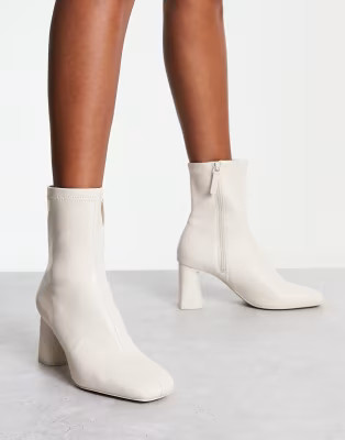 Stradivarius mid heel sock boot in white | ASOS | ASOS (Global)