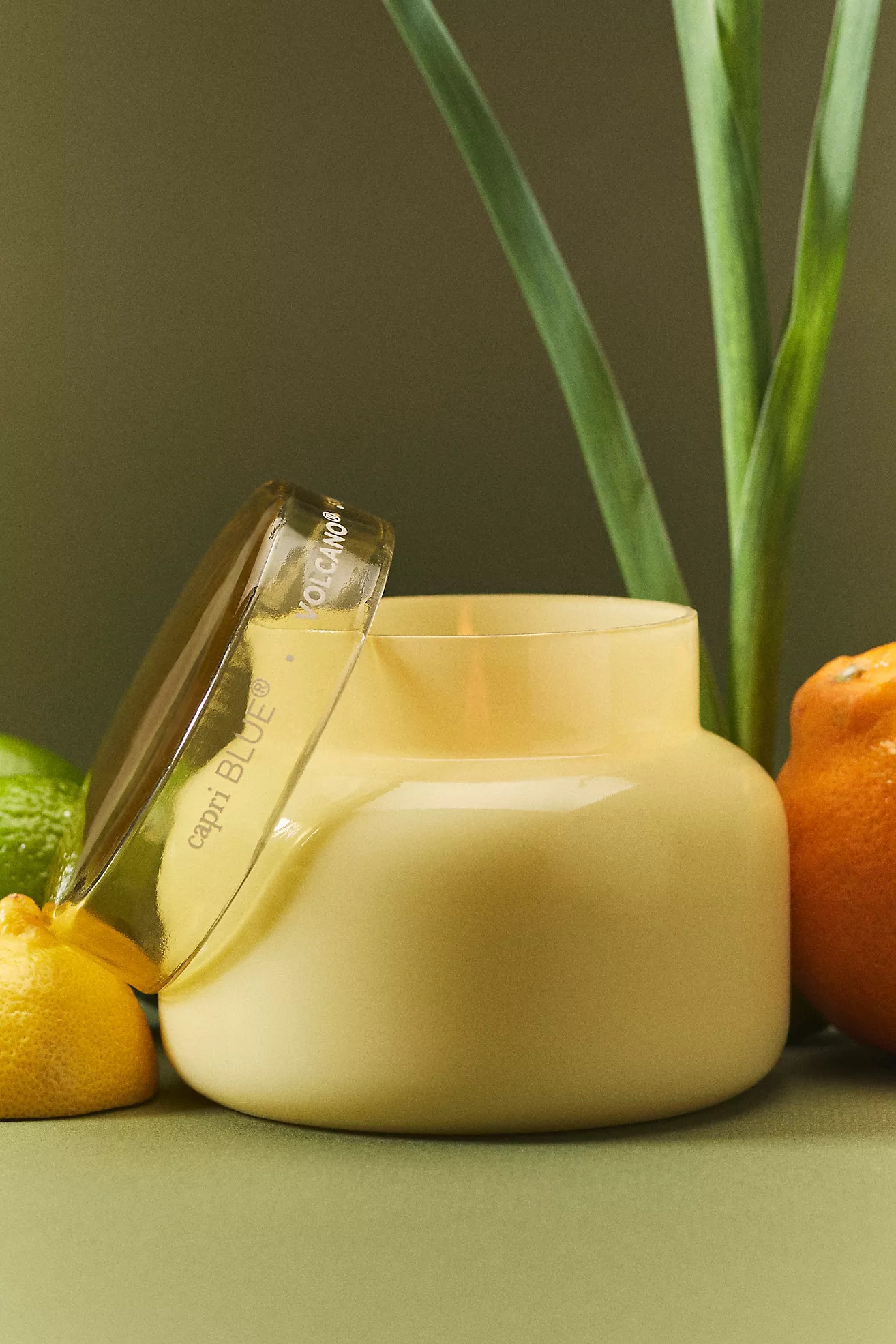 Capri Blue Volcano Spring Yellow Glass Jar Candle | Anthropologie (US)