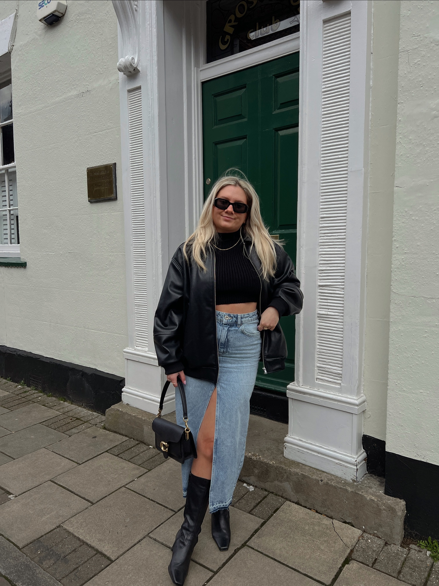 long midi maxi denim split front skirt, black coach tabby bag, black ribbed top, black collared leather bomber jacket, prada sunglasses for spring

#LTKeurope #LTKstyletip #LTKFind