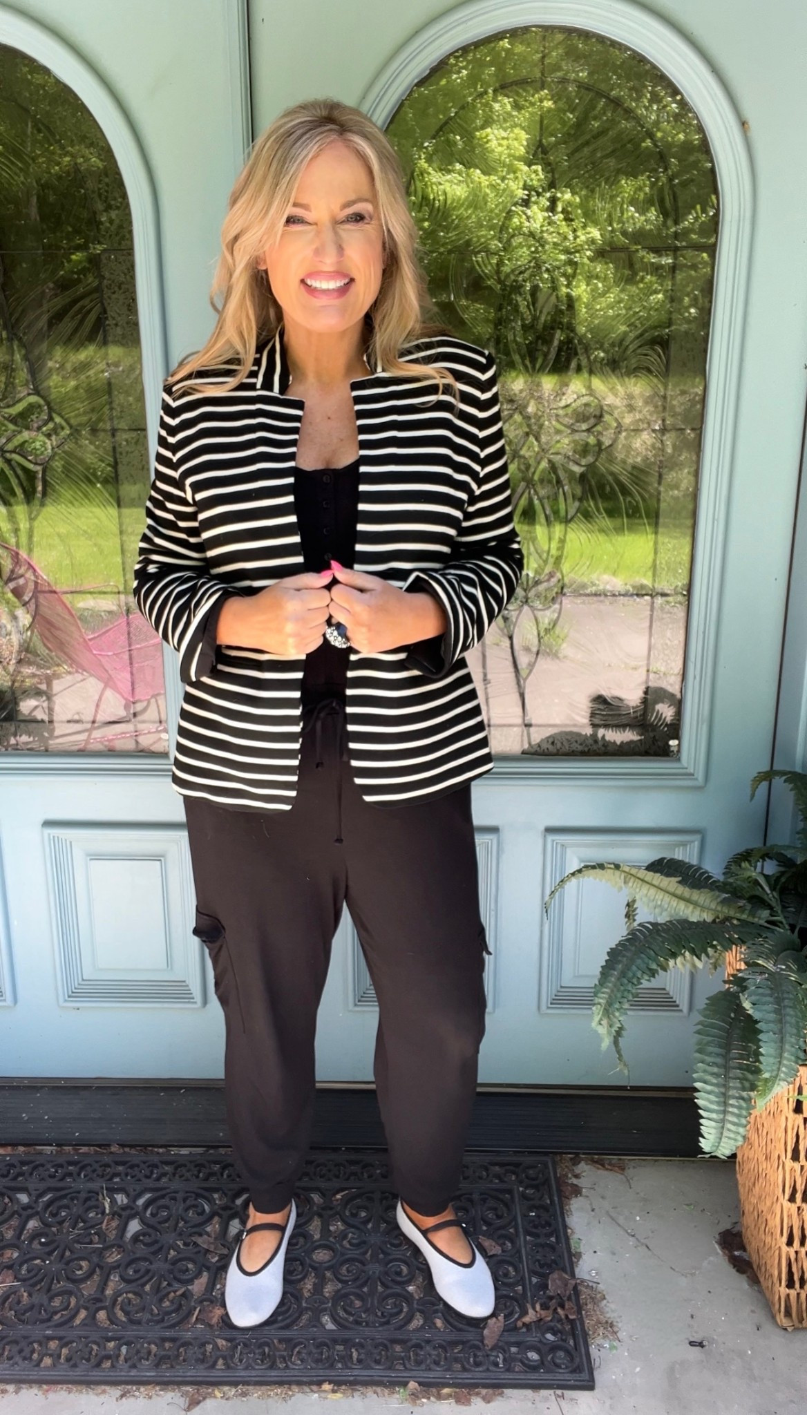 Black jumpsuit, sleeveless, drawstring tie waist.  Wearing large.

Black and white striped blazer, wearing a large.

Blank and silver Mary Jane’s 

#LTKOver40 #LTKMidsize #LTKWorkwear