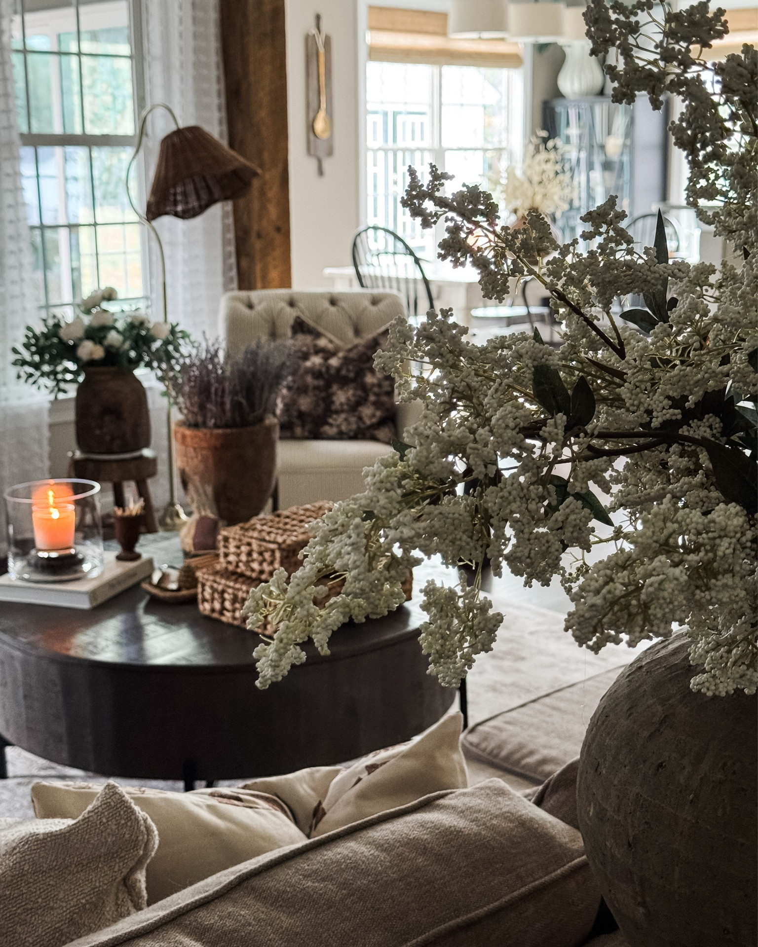 Slowly transitioning my living room for summer🤍

Console table, ottomans, floral throw blanket, black candelabra, vintage wood bowl, matches, glass cylinder, candle pedestal, pussy Willow, round coffee table, vintage wood mortar, lavender, floor lamp with woven shade, woven storage boxes, vintage inspired area rug, tiny vintage urn, eucalyptus wreath, matches, vintage inspired magnifying glass, vintage pineapple snuffer, white berry stems, taupe vase, upholstered side chair, floral pillow cover, gingham pillow cover, pillow insert

#LTKstorytime #LTKSeasonal #LTKHome