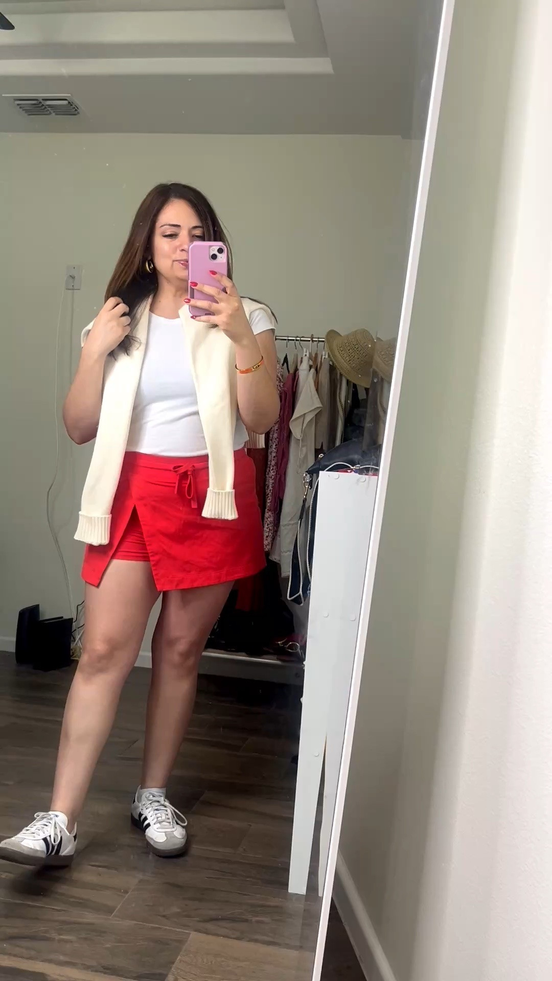A casual style for a summer day can wear for 4th of July size medium in skort and USA sweater

#LTKootd #LTKSaleAlert #LTKPetite