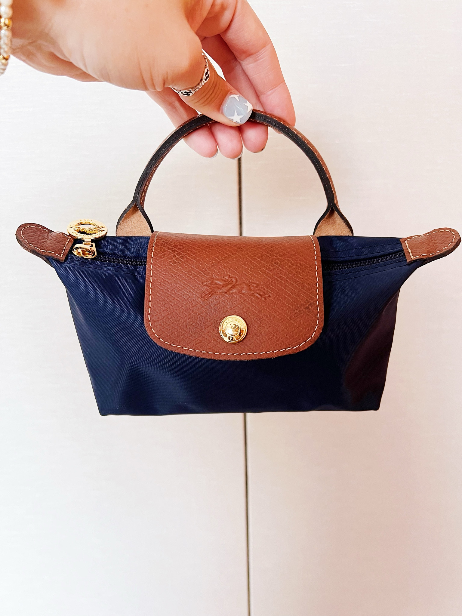 One of my favorite little Longchamp bags! Included in the #NSALE - holds a lot! (Big iPhone, lipsticks, small wallet, compact) 

#LTKxNSale #LTKItBag #LTKSummerSales