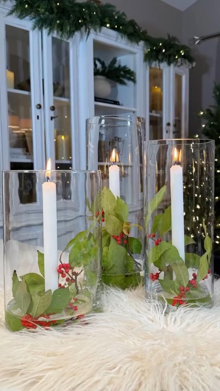 Taper Candle Holiday Centerpiece ✨ 
Create this elegant holiday DIY centerpiece with ease this season! Taper candles are everywhere, and you don’t need a taper holder to achieve this beautiful look. Simply hot glue a taper candle in the center of a glass cylinder or other vessel, pour in a little water, and add fresh-cut greens and holly from your yard or grocery store. Light it up and enjoy the warm glow! 

Give it a try for your next gathering! 

Holiday DIY
Christmas Decor
Holiday Tablescape



#LTKHoliday #LTKParties #LTKHome