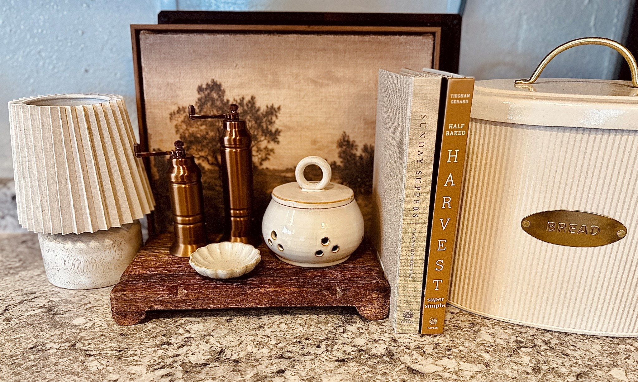 Sharing a little kitchen corner that I love🤍 Proof that functional pieces can still be beautiful + My mini faux wood lamp is back in stock and now comes in new colors! 

#homedecor #kitchencounterstyling 

#LTKSeasonal #LTKHome