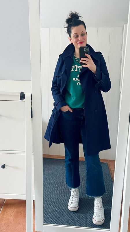  • Navy cotton trench-coat #comptoirdescotonniers (similar, linked)
 • Green campus "Seattle" sweatshirt #kiabi
 • Flare cropped "Sienna" jeans #mango (linked)
 • White leather "Chuck Taylor" high tops #converse (linked)
 • "Hot pink" lip balm pencil #labello (linked)
• « Club » eyeshadow #maccosmetics (linked)
 • Chunky necklace #hm (similar, linked) 

#LTKover40 #LTKmidsize #LTKeurope