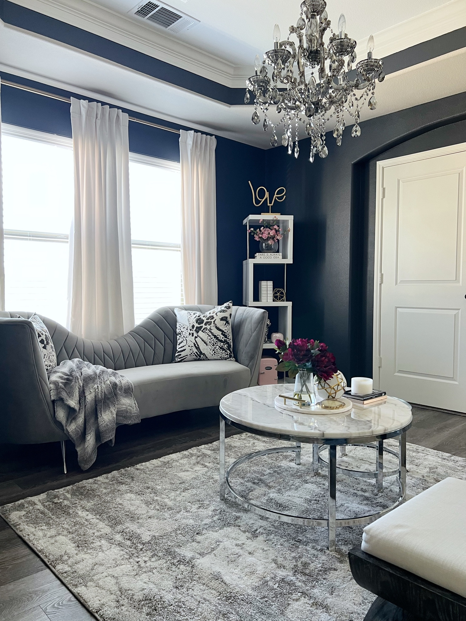Shop this space! Perfect decor for sitting room or home office #homeoffice #getorganized #homedecor #sofas #coffeetable #moderndecor #chandelier

#LTKFind #LTKsalealert #LTKhome