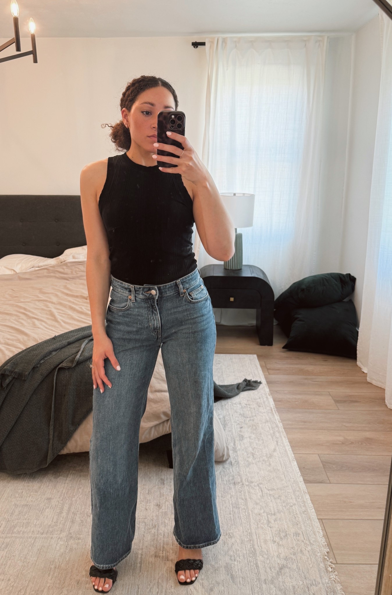 I’m a sucker for elevated basics! Building my capsule wardrobe with wide leg medium wash jeans, classic crew neck black tank and kitten heel sandals 🖤

#LTKStyleTip #LTKWorkwear #LTKShoeCrush
