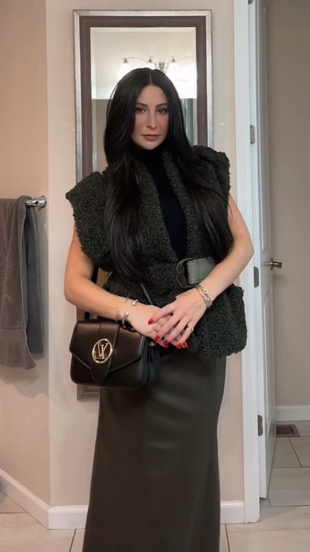 Get dressed with me for dinner & a comedy show. 

Marie Oliver's Astrid vest is crafted of sherpa. The North Carolina-based brand finishes this style with a bold faux leather belt. The vest paired with an alt-leather maxi skirt, black turtleneck, and black booties make for an elevated winter look.

#LTKstyletip #LTKVideo #LTKSeasonal