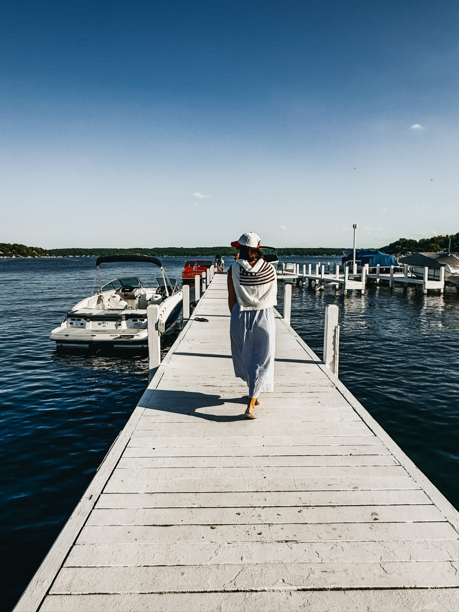Red, white & blue outfit idea! 🇺🇸MDW boating outfit!  
• blue & white striped dress - size small 💙
• flag sweater - size medium 
• jelly flats - size 8
• USA yacht club hat

#LTKOver40 #LTKTravel #LTKootd