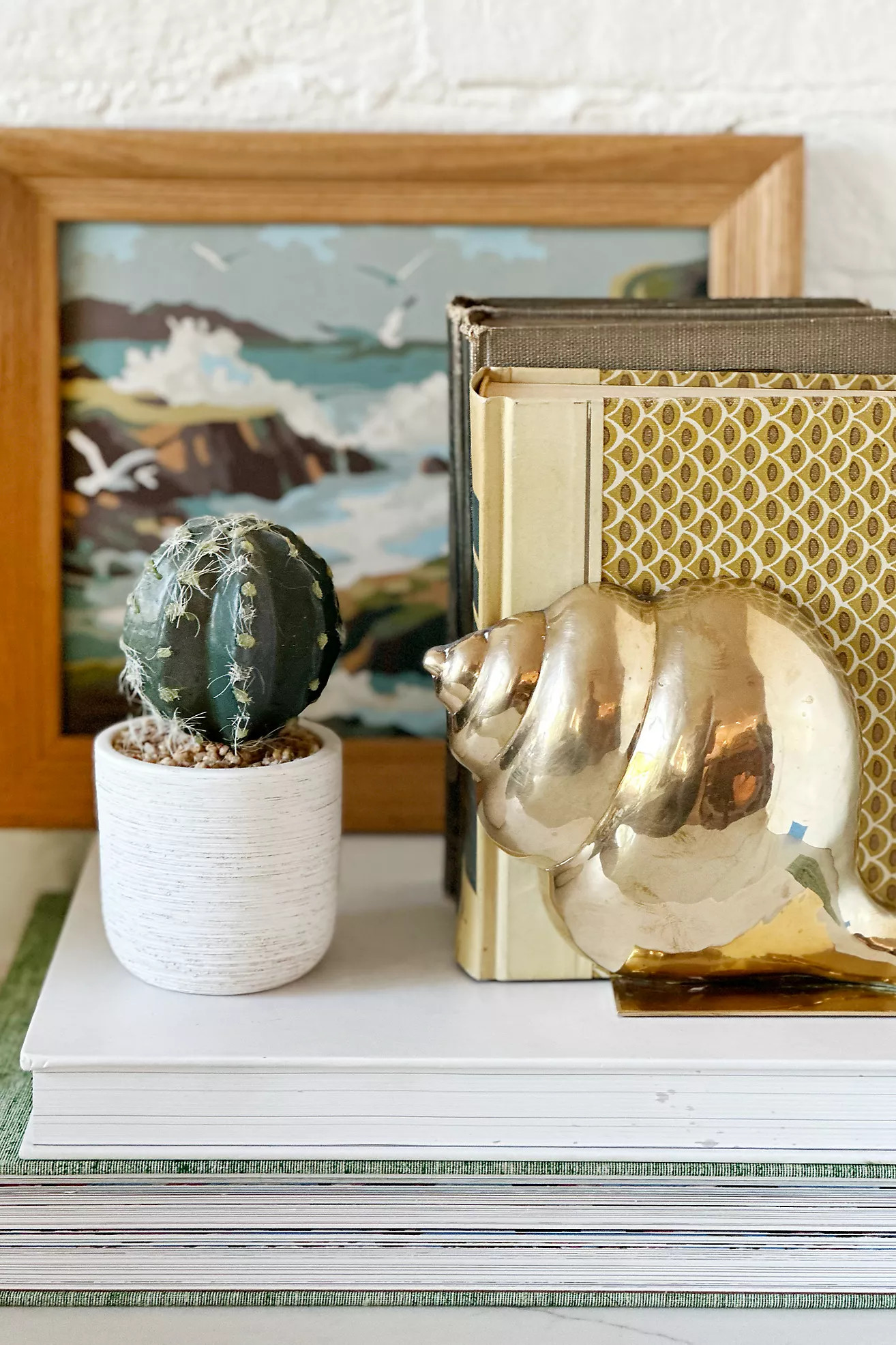 Old Flame Candle Co. Vintage Brass Conch Shell Bookends | Anthropologie (US)